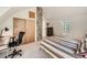 Bedroom with wood closets and a brick chimney at 1300 Main St, Georgetown, CO 80444