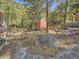 Rustic patio with red chairs and mountain views at 1300 Main St, Georgetown, CO 80444