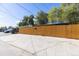 Property exterior with a new wooden fence and a concrete driveway at 1020 Stuart St, Denver, CO 80204