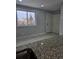 Kitchen area with granite countertop and tile flooring at 5387 Billings St, Denver, CO 80239