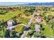 Aerial view of a residential area with houses and mountain views at 7474 Spring Drive, Boulder, CO 80303