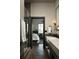 Spa-like bathroom with a walk-in shower and double vanity at 7474 Spring Drive, Boulder, CO 80303