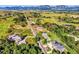 Aerial view showcasing a neighborhood with new construction homes and mountain backdrop at 7474 Spring Drive, Boulder, CO 80303