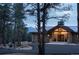Luxury home nestled in the trees with a welcoming entrance at 7474 Spring Drive, Boulder, CO 80303