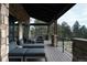 Relaxing outdoor deck with comfortable seating and mountain views at 7474 Spring Drive, Boulder, CO 80303