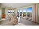 Relaxing sitting room with stunning views and access to deck at 6959 E Spur Ln, Parker, CO 80138