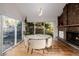 Bright dining room features a round table with six chairs and fireplace at 318 Lookout View Ct, Golden, CO 80401