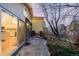 Back patio with flagstone flooring and access to kitchen at 318 Lookout View Ct, Golden, CO 80401