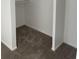 Walk-in closet with carpeted flooring and shelving at 912 S Peoria St, Aurora, CO 80012