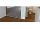 Small bathroom with a toilet and sink, and wood-look flooring at 912 S Peoria St, Aurora, CO 80012