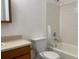 Clean bathroom with shower/tub, toilet, and vanity at 912 S Peoria St, Aurora, CO 80012