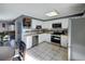 Modern kitchen featuring stainless steel appliances and an open layout at 13969 E Utah Cir, Aurora, CO 80012