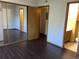 Bright bedroom with mirrored closet doors and access to bathroom at 1094 S Dearborn St # 107, Aurora, CO 80012