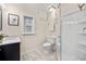 Bathroom with shower and updated vanity at 1516 Lafayette St, Denver, CO 80218