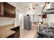 Modern kitchen with granite countertops and stainless steel appliances at 1516 Lafayette St, Denver, CO 80218