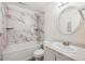 Bathroom with shower/tub and vanity at 1289 S Monaco Pkwy, Denver, CO 80224