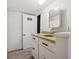 Small bathroom with sink and medicine cabinet at 1289 S Monaco Pkwy, Denver, CO 80224
