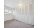 Bedroom with large closet and window at 1289 S Monaco Pkwy, Denver, CO 80224