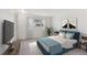 Bedroom with a bed, window, and closet at 1289 S Monaco Pkwy, Denver, CO 80224
