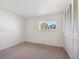 Simple bedroom with closet and window at 1289 S Monaco Pkwy, Denver, CO 80224