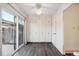 Bright dining area with built-in storage and access to patio at 1289 S Monaco Pkwy, Denver, CO 80224