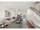 Living room featuring hardwood floors and a contemporary aesthetic at 1289 S Monaco Pkwy, Denver, CO 80224