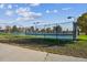 Community tennis courts with ample green space at 1289 S Monaco Pkwy, Denver, CO 80224