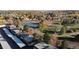 Aerial showing townhomes near park and tennis courts at 1289 S Monaco Pkwy, Denver, CO 80224