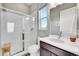 Clean bathroom with shower, toilet and vanity at 16439 Arrow Peak Way, Broomfield, CO 80023