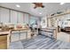 Bright kitchen with butcher block countertops and eat-in island at 935 Newark St, Aurora, CO 80010