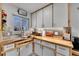 Kitchen with stainless steel sink and wood countertops at 935 Newark St, Aurora, CO 80010