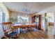 Dining room with wooden table, chairs, and hutch at 6597 S State Highway 83, Franktown, CO 80116