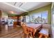 Kitchen dining area with wood table and chairs at 6597 S State Highway 83, Franktown, CO 80116