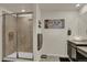 Bathroom with shower, vanity, and granite countertop at 720 Avena Dr, Elizabeth, CO 80107