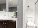 Bathroom with toilet and sink vanity at 11941 Bellaire St # B, Thornton, CO 80233