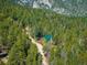 Mountain cabin nestled in a lush forest setting at 80 Outlook Dr, Golden, CO 80403