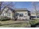 Private backyard with patio and well-maintained landscaping at 6656 S Shawnee St, Aurora, CO 80016