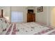 Comfortable bedroom with a TV and plenty of natural light at 6656 S Shawnee St, Aurora, CO 80016