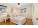 Bright bedroom with hardwood floors and ample natural light at 3075 Elm St, Denver, CO 80207