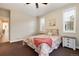 Bedroom with a view of the dining area and access to the hallway at 10100 Bluffmont Ln, Lone Tree, CO 80124