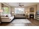 Living room with fireplace, hardwood floors, and comfortable seating at 10100 Bluffmont Ln, Lone Tree, CO 80124