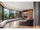 Cozy sitting area with a stone fireplace and stunning views at 30786 Snowbird Ln, Evergreen, CO 80439