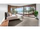 Bright bedroom with mountain views and sliding glass doors at 30786 Snowbird Ln, Evergreen, CO 80439
