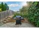 Backyard with grill and lush greenery at 1851 Lochmore Dr, Longmont, CO 80504