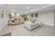 Finished basement features a comfortable lounging area and kitchenette at 3955 S Uinta St, Denver, CO 80237
