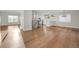 Dining area with hardwood floors and kitchen access at 3955 S Uinta St, Denver, CO 80237