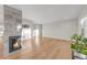 Living room with hardwood floors and fireplace at 3955 S Uinta St, Denver, CO 80237