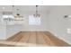 Bright dining room with hardwood floors and chandelier at 3955 S Uinta St, Denver, CO 80237