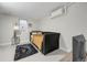 Cozy basement bedroom with a daybed and window at 3955 S Uinta St, Denver, CO 80237