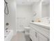 Clean bathroom with white subway tile and a modern vanity at 3955 S Uinta St, Denver, CO 80237